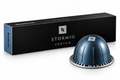 A Stormio Vertuo Nespresso coffee capsule in a metallic dark blue dome shape, shown next to its black and blue retail packaging box on a clean white background.