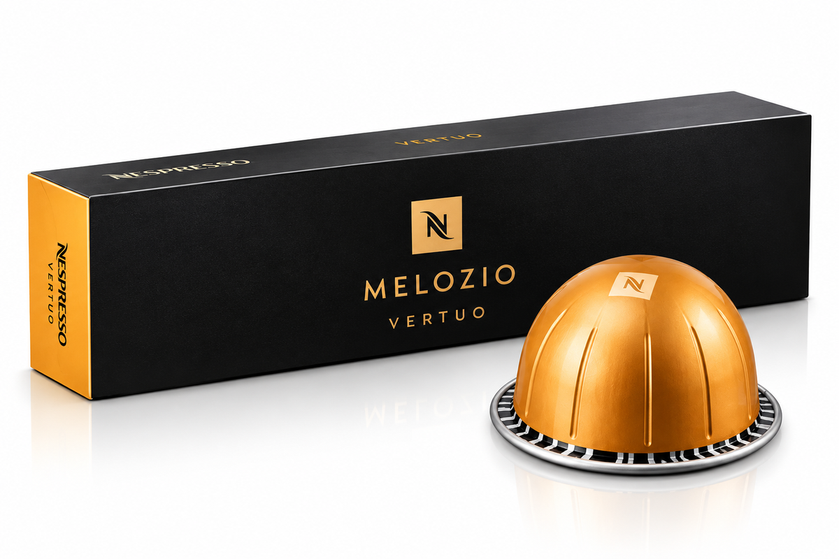 A Melozio Vertuo Nespresso capsule coffee pod in metallic gold with its black and gold retail box, shown on a clean white background.